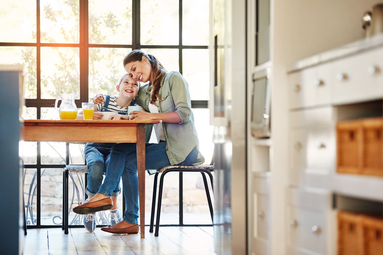 A family relaxing in a freshly cleaned home.